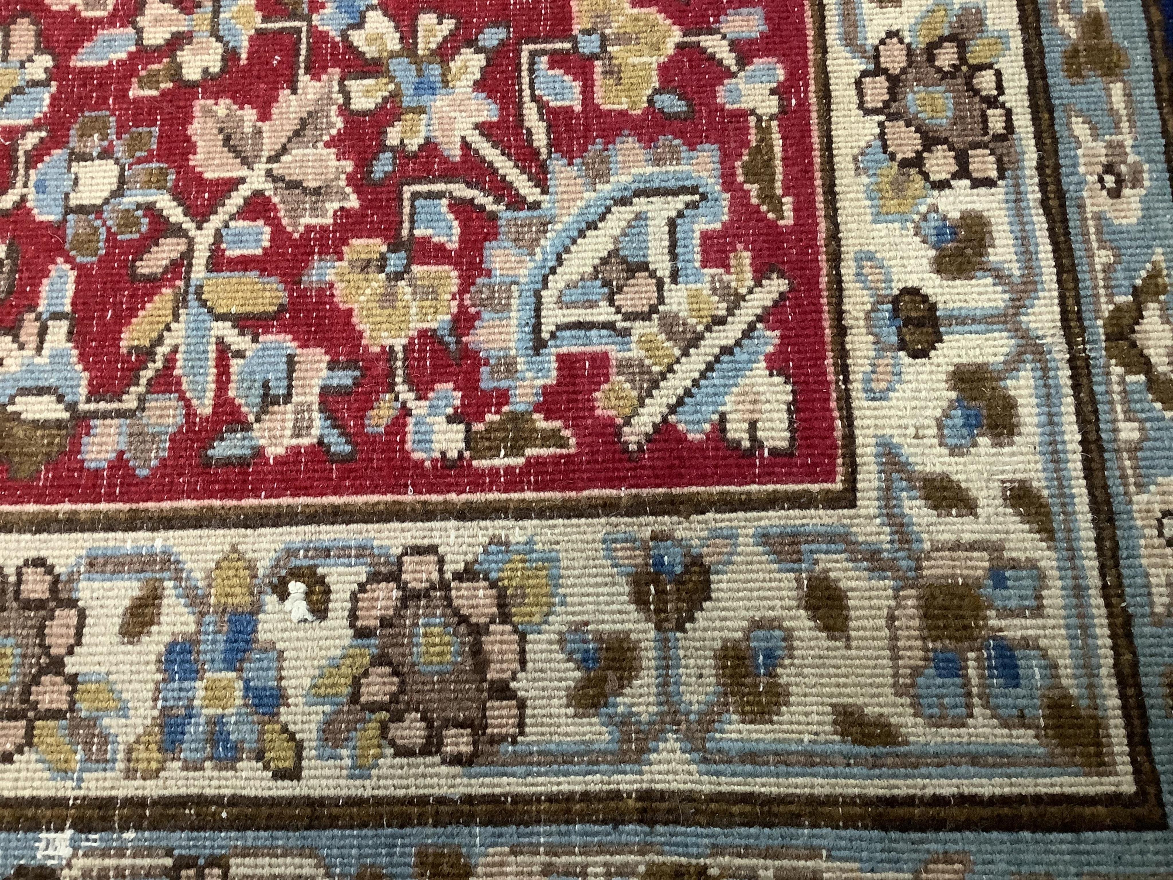 A North West Persian blue ground carpet, 394 x 284cm. Condition - good